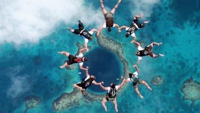 Fly In The Great Blue Hole Belize picture Weird Blue Holes That Are Magnets for Divers Around the World - 7